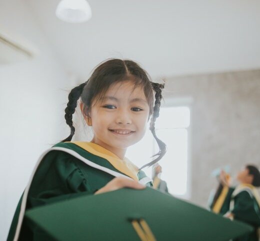 Girl with cap and gown.